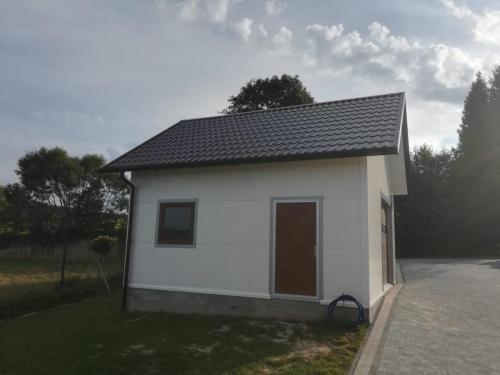 Garaż ocieplany 35m2 wykonany z płyty warstwowej pokrycie blachodachówką